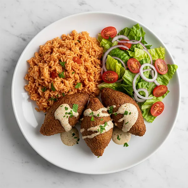 Beef Kibbeh With Arabic Tomato Rice And Harissa Tahini Sauce